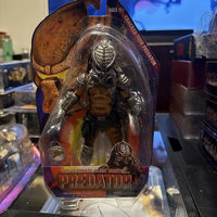 Cracked Tusk Predator action figure